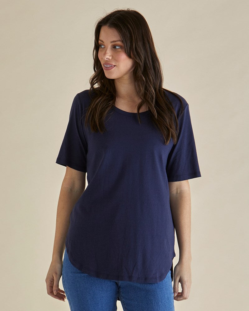 Image of a model wearing Tops. Productname: Betty Basics Ariana Tee Navy in Navy colour by brand - Betty Basics