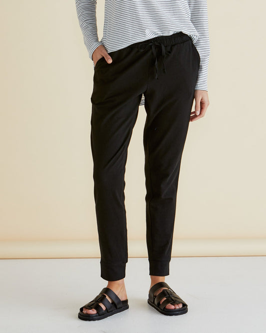 Image of a model wearing Pants. Productname: Betty Basics Heidi Jogger Pants Black in Black colour by brand - Betty Basics