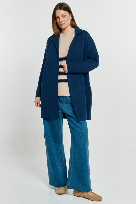 Image of a model wearing Outerwear. Product name - Bristol Coatigan Navy in Navy colour by brand - Betty Basics