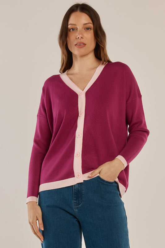 Image of a model wearing Outerwear. Productname: Hampton Cardigan Pink in Pink colour by brand - Betty Basics