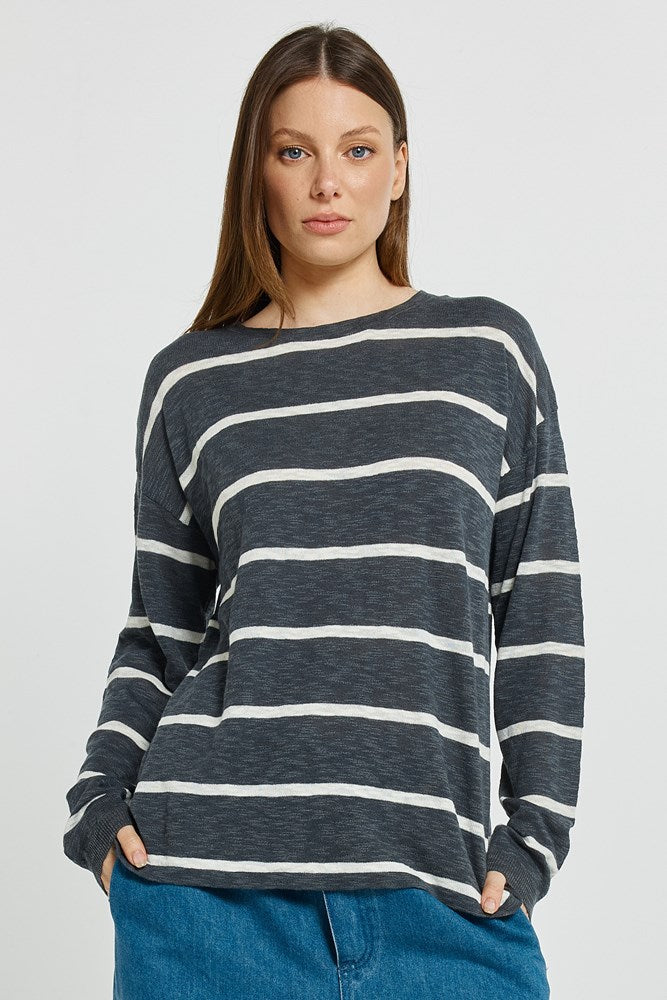 Image of a model wearing Tops. Product name - Natasha Knit Top Charcoal Stripe in Charcoal Stripe colour by brand - Betty Basics