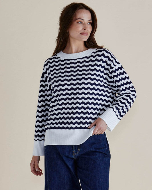 Image of a model wearing Outerwear. Productname: Betty Basics Ember Knit Jumper Navy Wave Stripe in Navy Wave Stripe colour by brand - Betty Basics