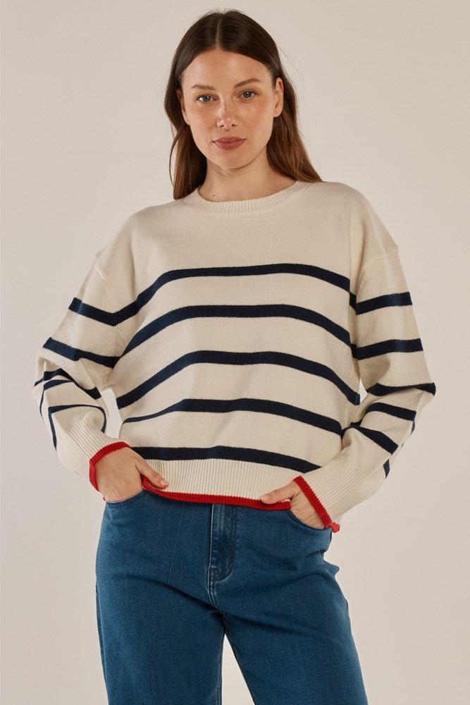 Image of a model wearing Outerwear. Product name - Leonie Knit Sweater Navy/Off-White Stripe in Navy/Off-White Stripe colour by brand - Betty Basics