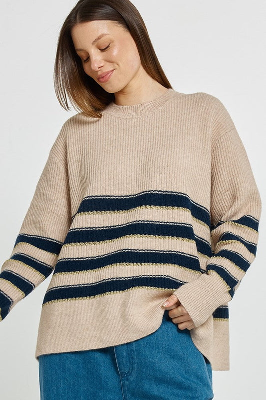 Image of a model wearing Outerwear. Product name - Camryn Sweater Navy/Cream/Gold Stripe in Navy/Cream/Gold Stripe colour by brand - Betty Basics