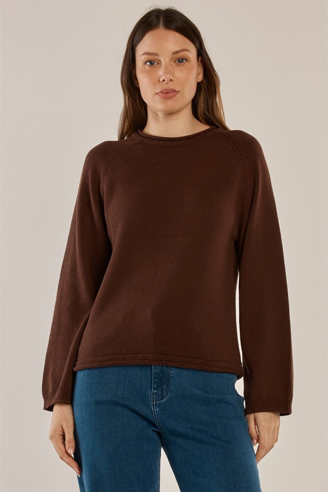 Image of a model wearing Outerwear. Product name - Carrie Knit Jumper Espresso in Espresso colour by brand - Betty Basics
