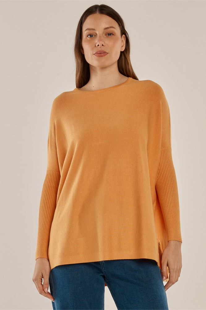 Image of a model wearing Outerwear. Productname: Betty Basics Blakely Batwing Sweater Orange in Orange colour by brand - Betty Basics