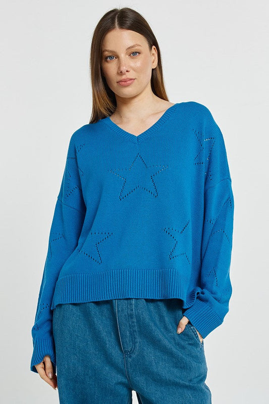 Image of a model wearing Outerwear. Product name - Selene Star Sweater Blue in Blue colour by brand - Betty Basics
