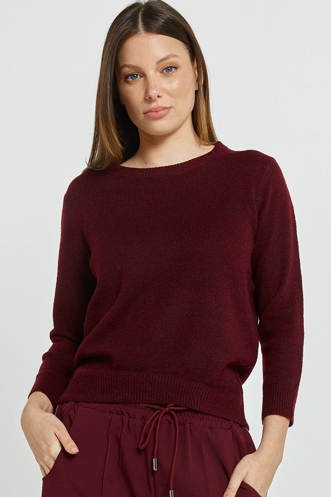 Image of a model wearing Outerwear. Product name - Morris Sweater Wine in Wine colour by brand - Betty Basics