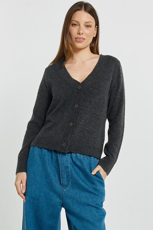 Image of a model wearing Outerwear. Product name - FiFi Cardigan Charcoal in Charcoal colour by brand - Betty Basics