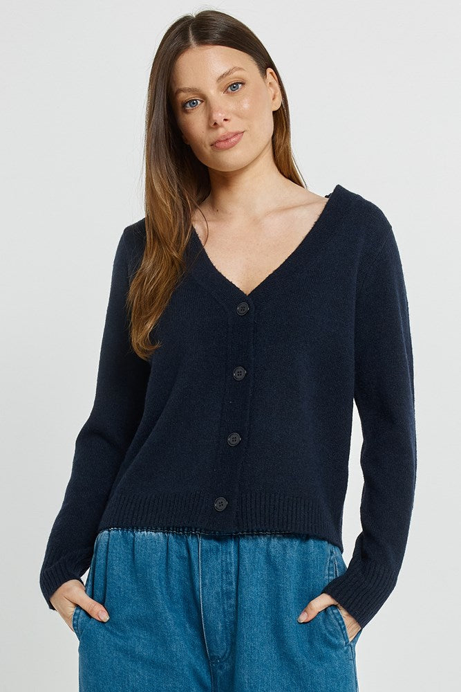 Image of a model wearing Outerwear. Product name - FiFi Cardigan Navy in Navy colour by brand - Betty Basics
