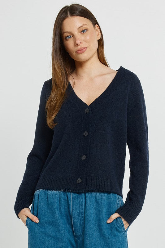 Image of a model wearing Outerwear. Product name - FiFi Cardigan Navy in Navy colour by brand - Betty Basics