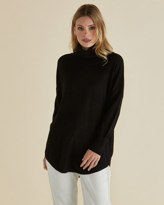 Image of a model wearing Outerwear. Productname: Betty Basics Fleur Roll Neck Jumper in Dark Blue colour by brand - Betty Basics