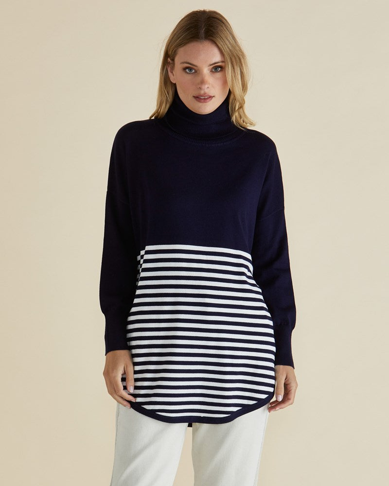 Image of a model wearing Outerwear. Productname: Betty Basics Fleur Roll Neck Jumper Navy Stripe in Navy Stripe Splice colour by brand - Betty Basics