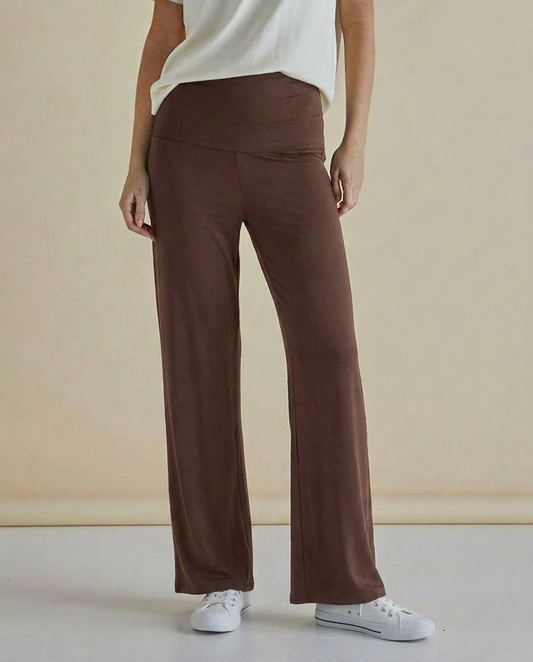 Image of a model wearing Pants. Product name - Houston Relax Pant Nutmeg in Nutmeg colour by brand - Betty Basics