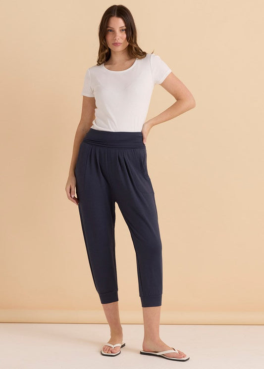 Image of a model wearing Pants. Productname: Betty Basics Tilly 3/4 Pant Petrol in Petrol colour by brand - Betty Basics