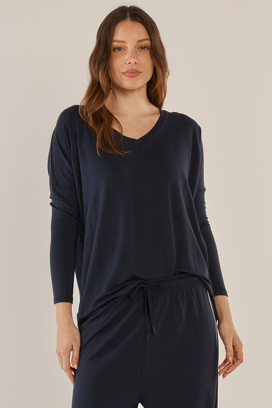 Image of a model wearing Tops. Productname: Betty Basics Munich Top Navy in Navy colour by brand - Betty Basics