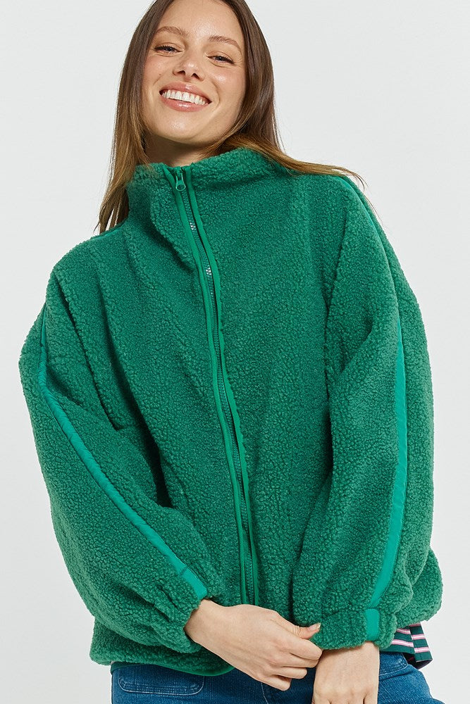 Image of a model wearing Outerwear. Product name - Aubrey Fleece Jacket Green/Dark Green in Green/Dark Green colour by brand - Betty Basics