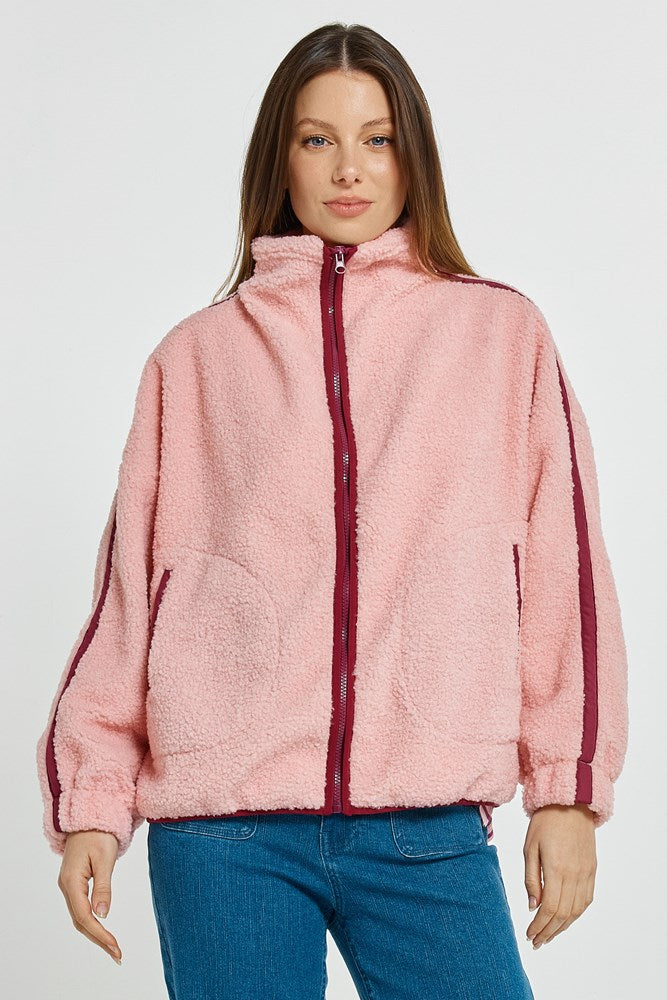 Image of a model wearing Outerwear. Product name - Aubrey Fleece Jacket Pink/Plum in Pink/Plum colour by brand - Betty Basics