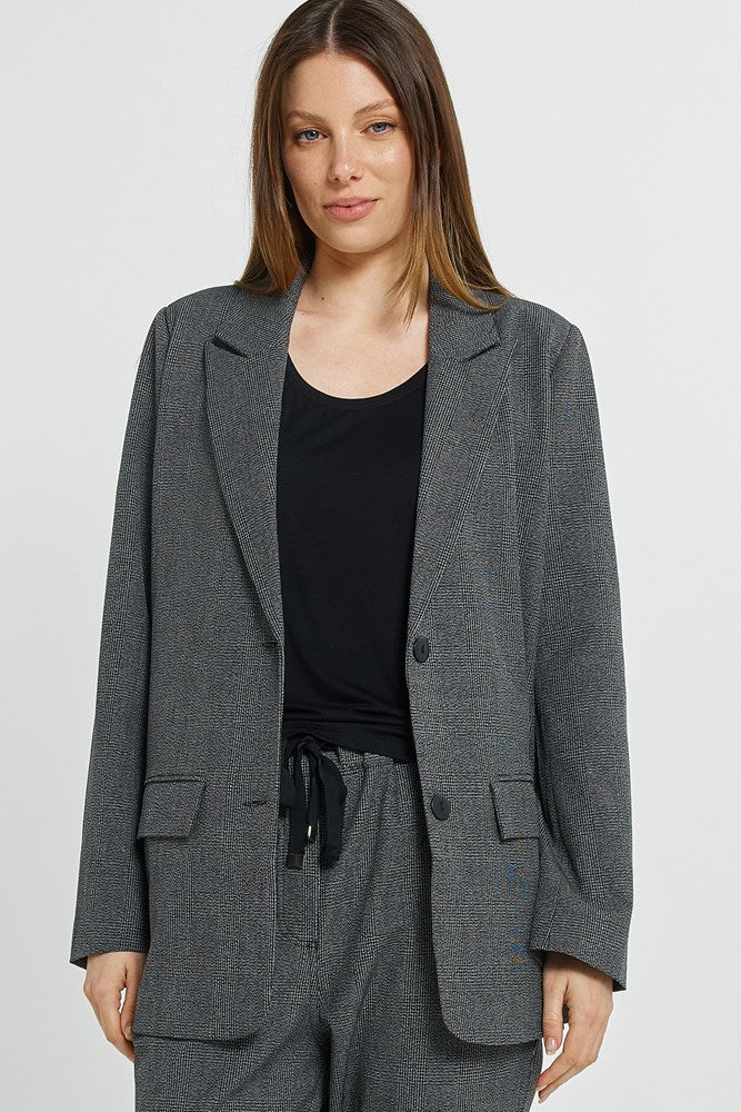 Image of a model wearing Outerwear. Product name - Kenzie Blazer Grey Check in Grey Check colour by brand - Betty Basics