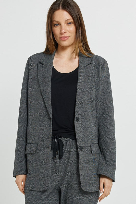 Image of a model wearing Outerwear. Product name - Kenzie Blazer Grey Check in Grey Check colour by brand - Betty Basics