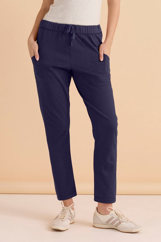 Image of a model wearing Pants. Productname: Betty Basics Romy Jogger Navy in Navy colour by brand - Betty Basics