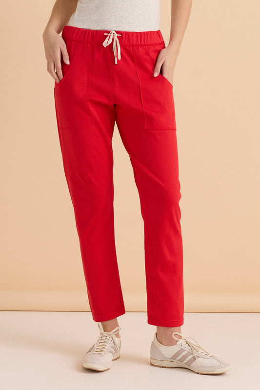 Image of a model wearing Pants. Productname: Betty Basics Romy Jogger Red in Red colour by brand - Betty Basics