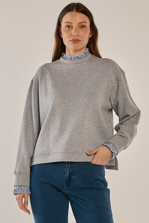 Image of a model wearing Outerwear. Product name - Juniper Jumper Heather Grey in Heather Grey colour by brand - Betty Basics