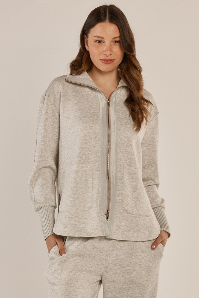 Image of a model wearing Outerwear. Product name - Sabina Sweatshirt Grey Marle in Grey Marle colour by brand - Betty Basics