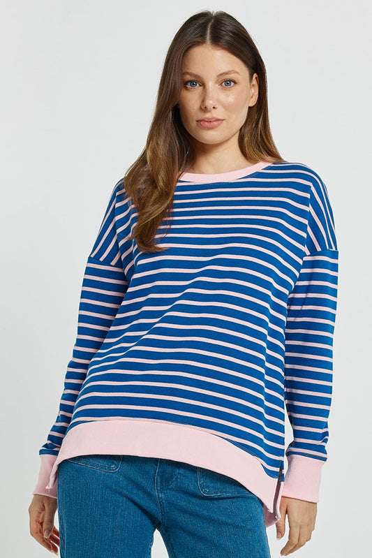 Image of a model wearing Outerwear. Product name - Tide Sweatshirt Blue/Pink Stripe in Blue/Pink Stripe colour by brand - Betty Basics