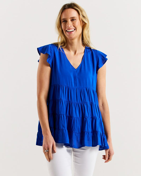 Image of a model wearing Tops. Productname: Betty Basics Danica Frill Top Cobalt Blue in Cobalt Blue colour by brand - Betty Basics