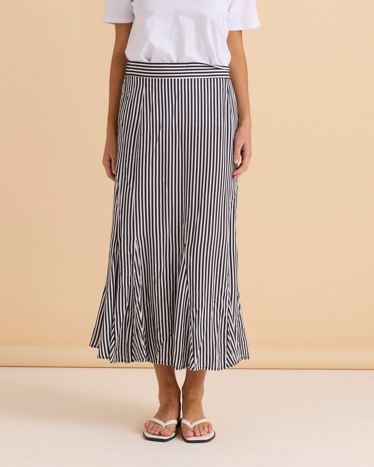 Image of a model wearing Skirts. Productname: Betty Basics Darla Skirt Navy Stripe in Navy Stripe colour by brand - Betty Basics