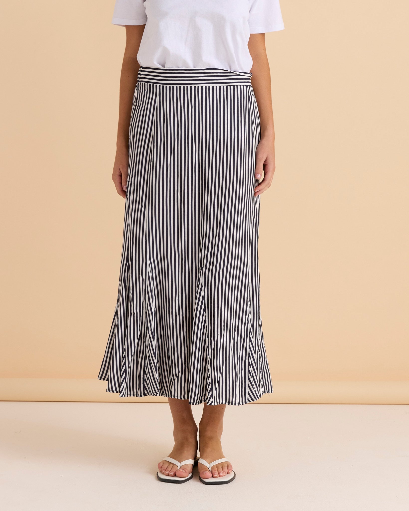Image of a model wearing Skirts. Productname: Betty Basics Darla Skirt Navy Stripe in Navy Stripe colour by brand - Betty Basics