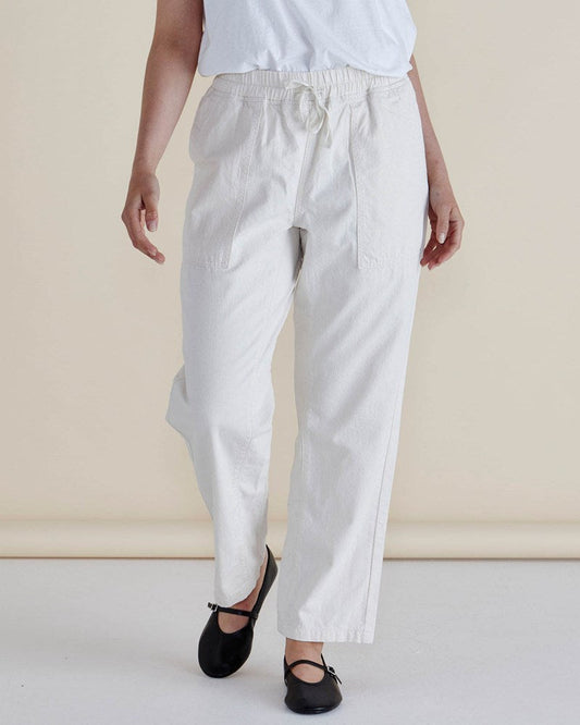 Image of a model wearing Pants. Productname: Betty Basics Quinn Cotton Jogger Dusty White in Dusty White colour by brand - Betty Basics
