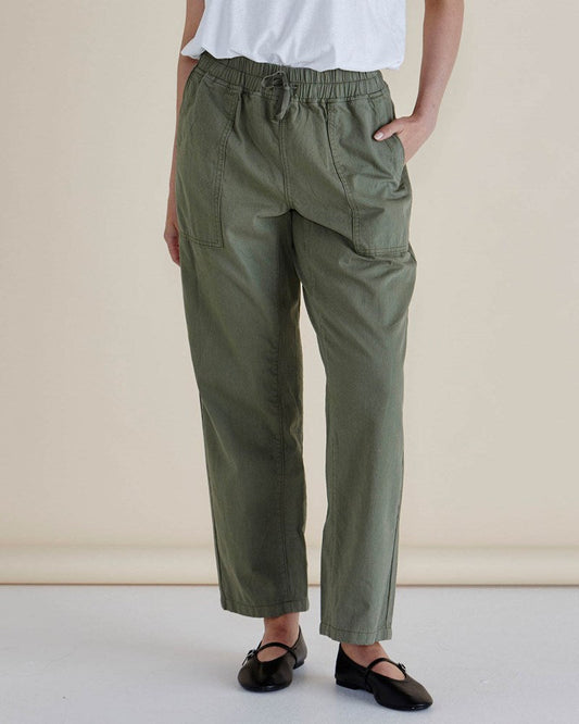 Image of a model wearing Pants. Productname: Betty Basics Quinn Cotton Jogger Khaki in Khaki colour by brand - Betty Basics