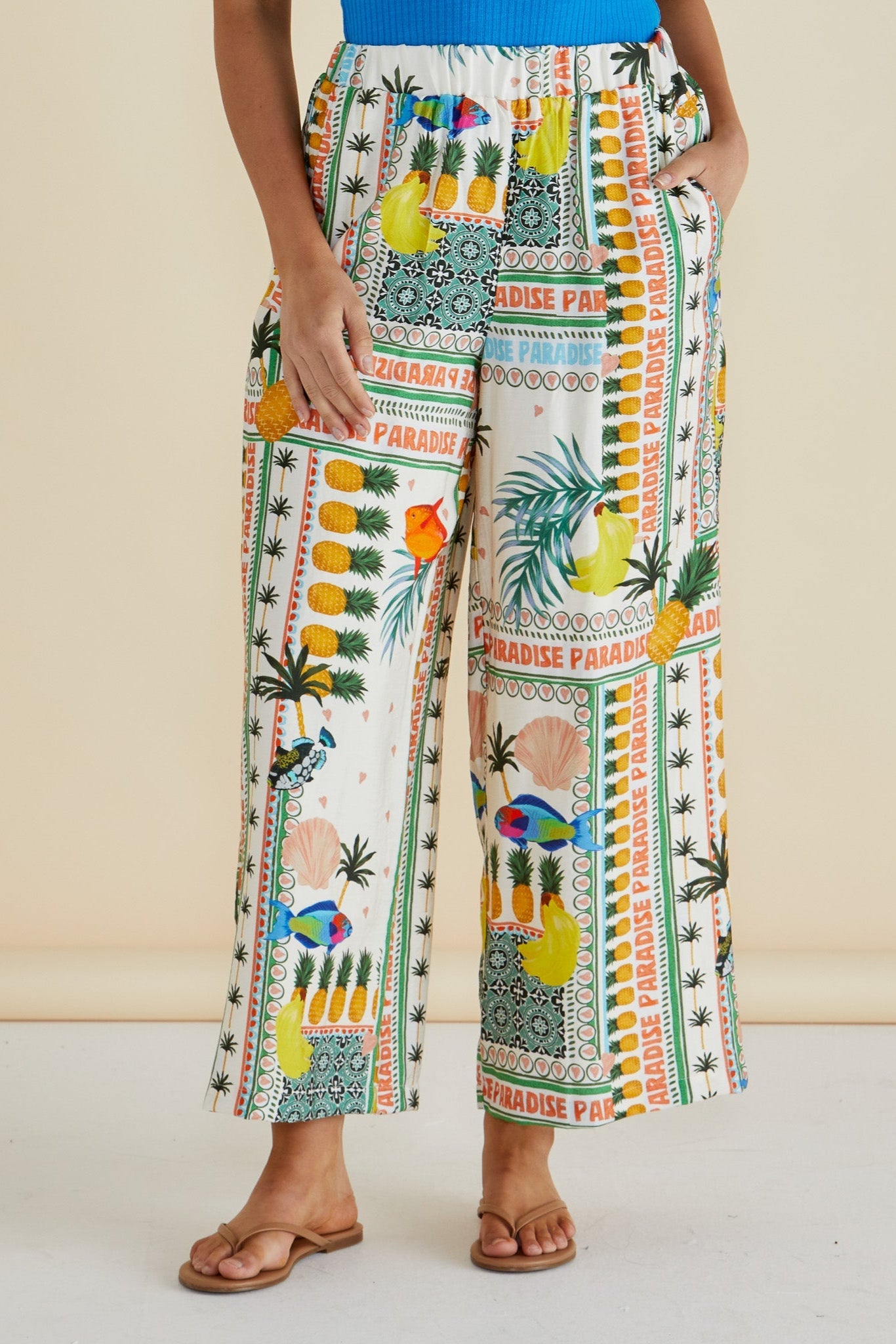 Image of a model wearing Pants. Productname: Betty Basics Sable Wide Leg Pant Paradise Print in Paradise Print colour by brand - Betty Basics