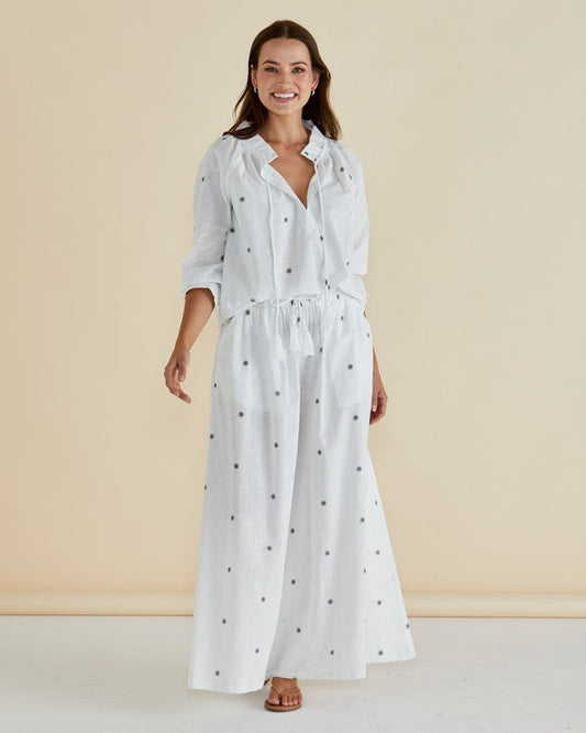 Image of a model wearing Pants. Productname: Betty Basics Tatum Wide Leg Pant Black Floral Print in Black Floral Print colour by brand - Betty Basics