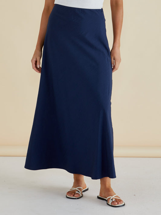 Image of a model wearing Skirts. Productname: Betty Basics Mindy Skirt Navy Blue in Navy Blue colour by brand - Betty Basics