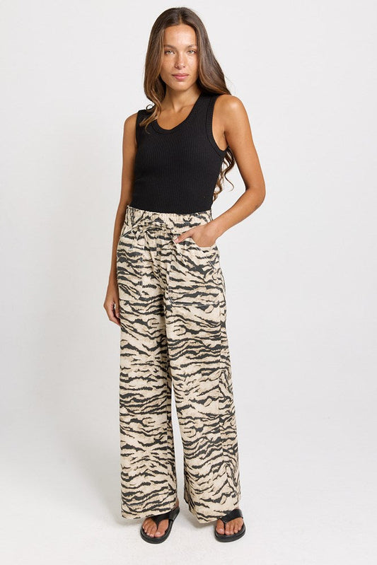 Image of Jeans. Product name - Saffra Wide Leg Jean Animal in Animal colour by brand - Betty Basics