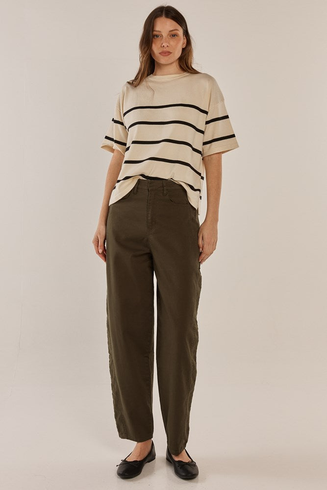 Image of a model wearing Pants. Productname: Betty Basics Barrel Leg Chino Khaki in Khaki colour by brand - Betty Basics