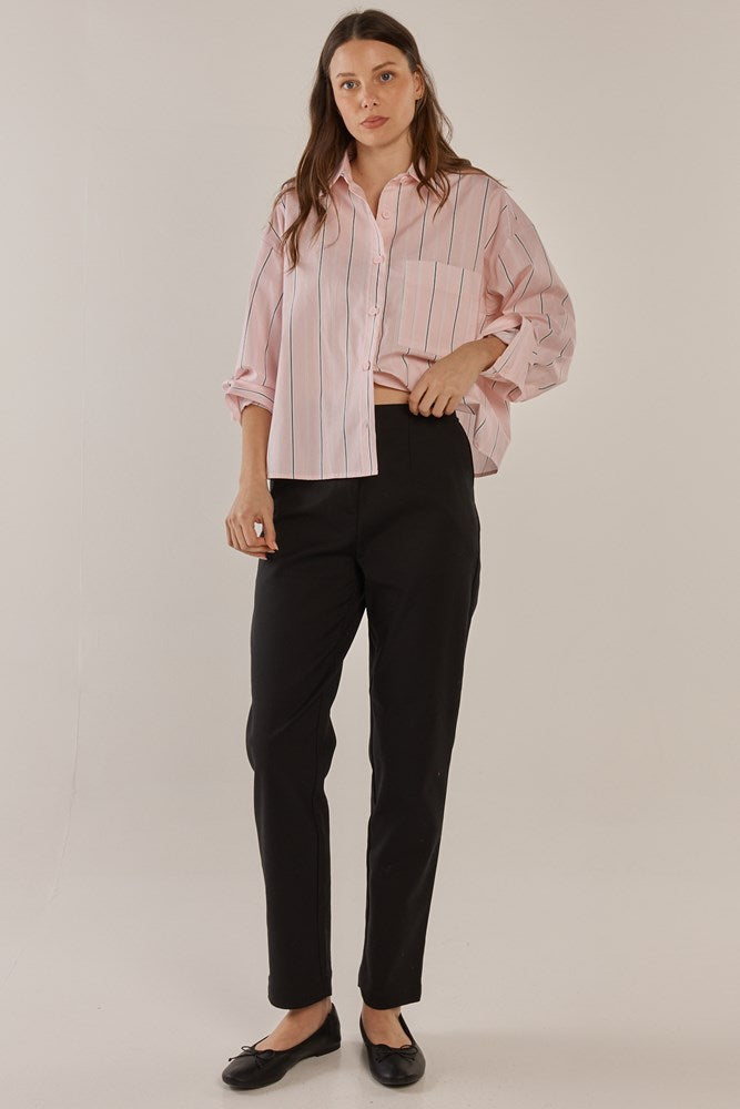 Image of a model wearing Pants. Productname: Betty Basics Paloma Straight Leg Pant Black in Black colour by brand - Betty Basics