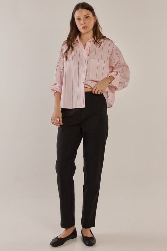 Image of a model wearing Pants. Productname: Betty Basics Paloma Straight Leg Pant Black in Black colour by brand - Betty Basics