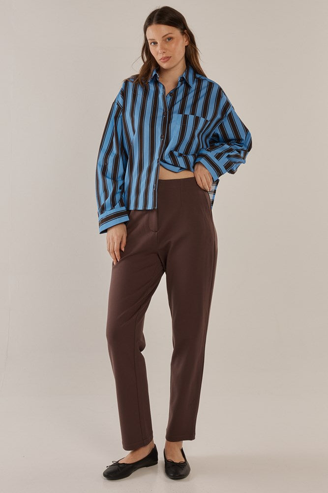 Image of a model wearing Pants. Productname: Betty Basics Paloma Straight Leg Pant Chocolate in Chocolate colour by brand - Betty Basics