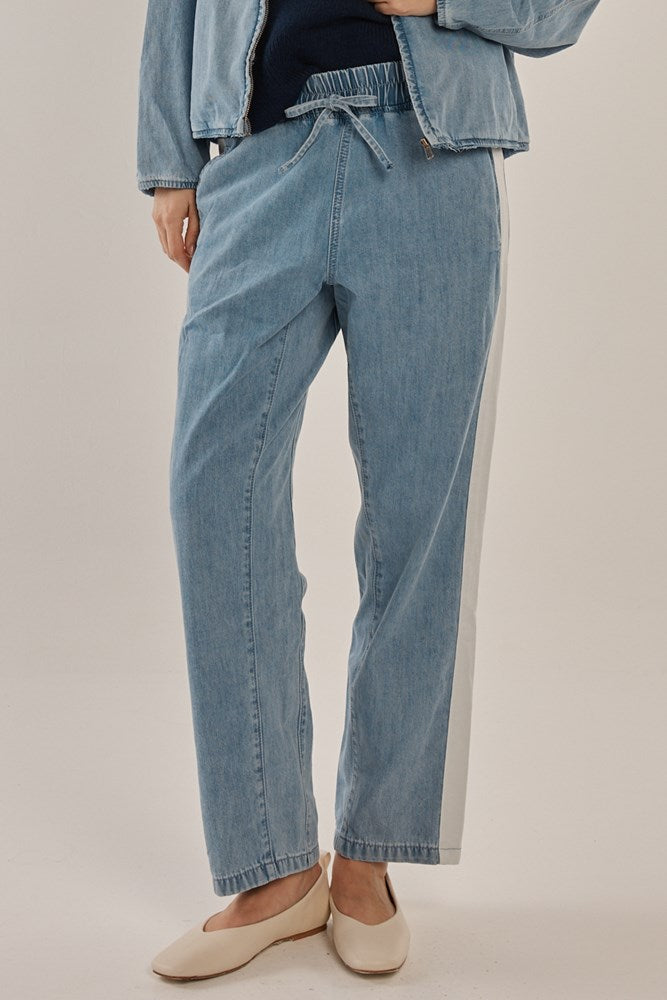 Image of a model wearing Pants. Productname: Betty Basics Callie Denim Jogger Medium Blue in Medium Blue colour by brand - Betty Basics