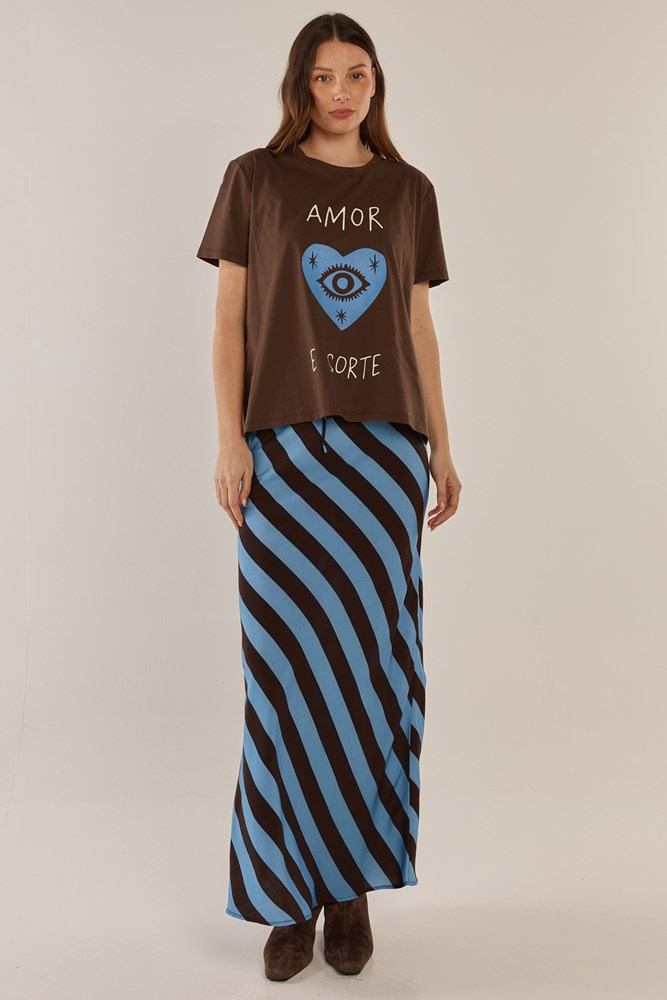 Image of a model wearing Skirts. Product name - Bec Bias Skirt Cornflower/Brown Stripe in Cornflower/Brown Stripe colour by brand - Betty Basics