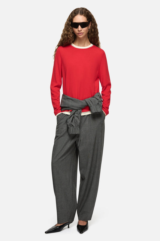 Image of a model wearing Pants. Product name - Sid Trousers Charcoal in Charcoal colour by brand - Blanca Studio