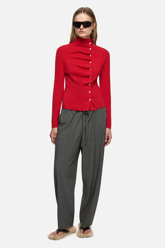 Image of a model wearing Outerwear. Product name - Ellidy Cardigan Red in Red colour by brand - Blanca Studio