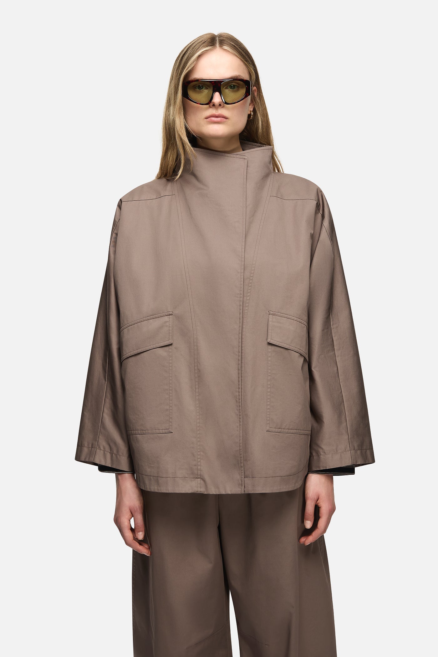 Image of a model wearing Outerwear. Product name - Freda Jacket Taupe in Taupe colour by brand - Blanca Studio