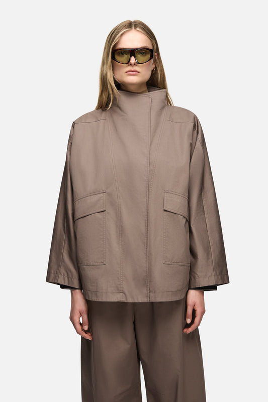 Image of a model wearing Outerwear. Product name - Freda Jacket Taupe in Taupe colour by brand - Blanca Studio