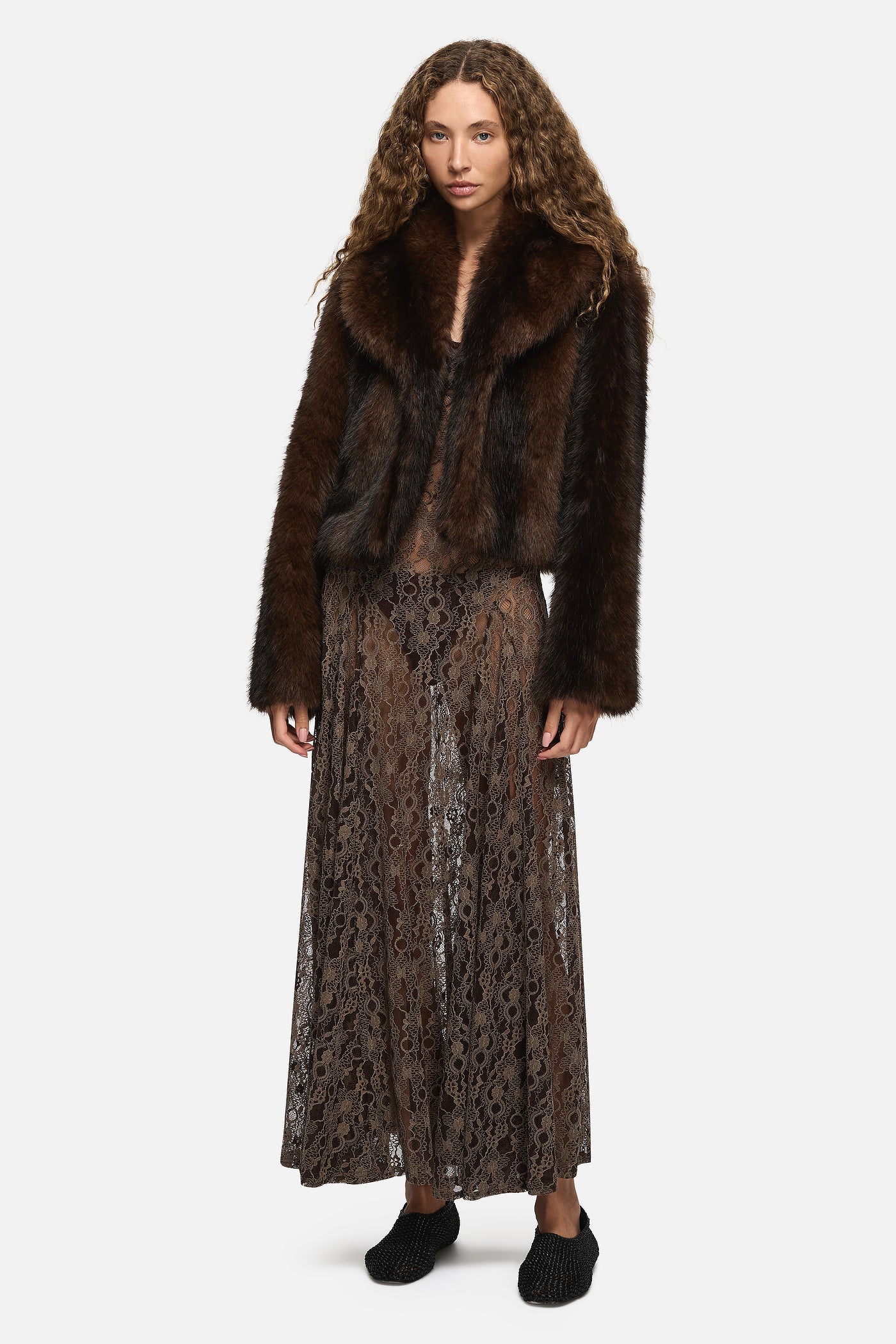 Image of a model wearing Outerwear. Product name - Joana Jacket Brown in Brown colour by brand - Blanca Studio