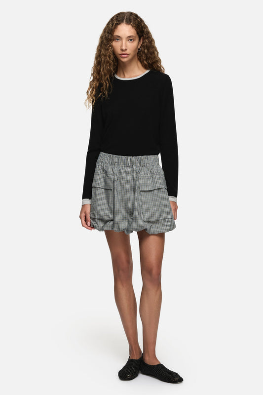Image of a model wearing Skirts. Product name - Laurel Skirt Blue in Blue colour by brand - Blanca Studio